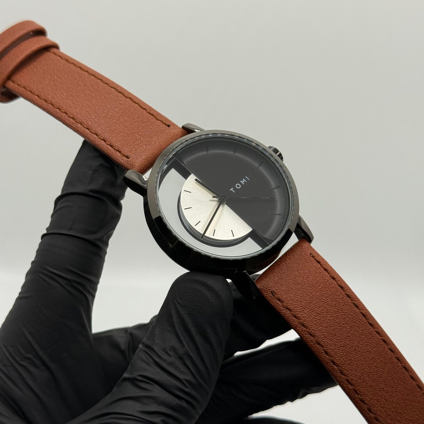 TOMI transparent dial with black leather strap
