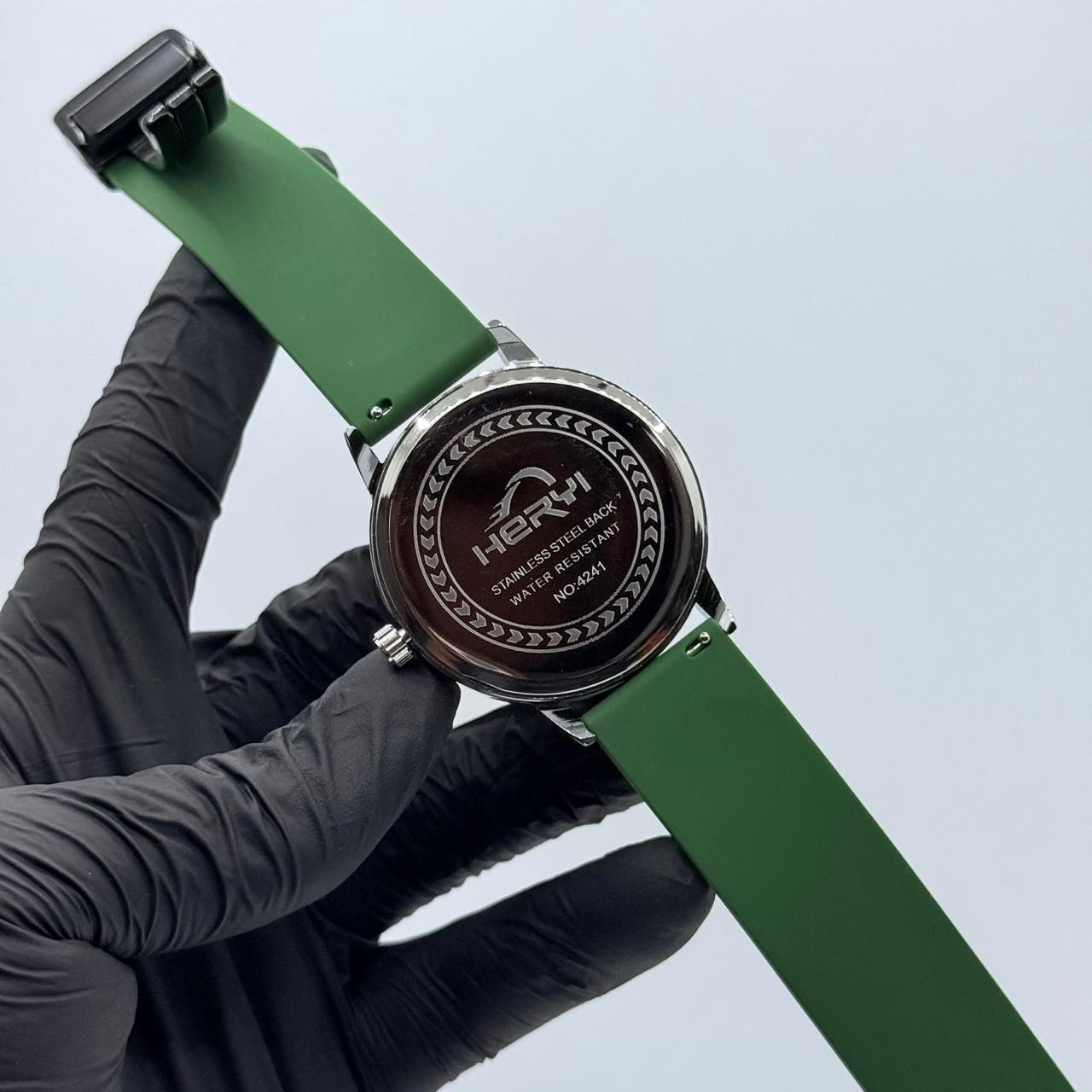 Casino watch with green strap