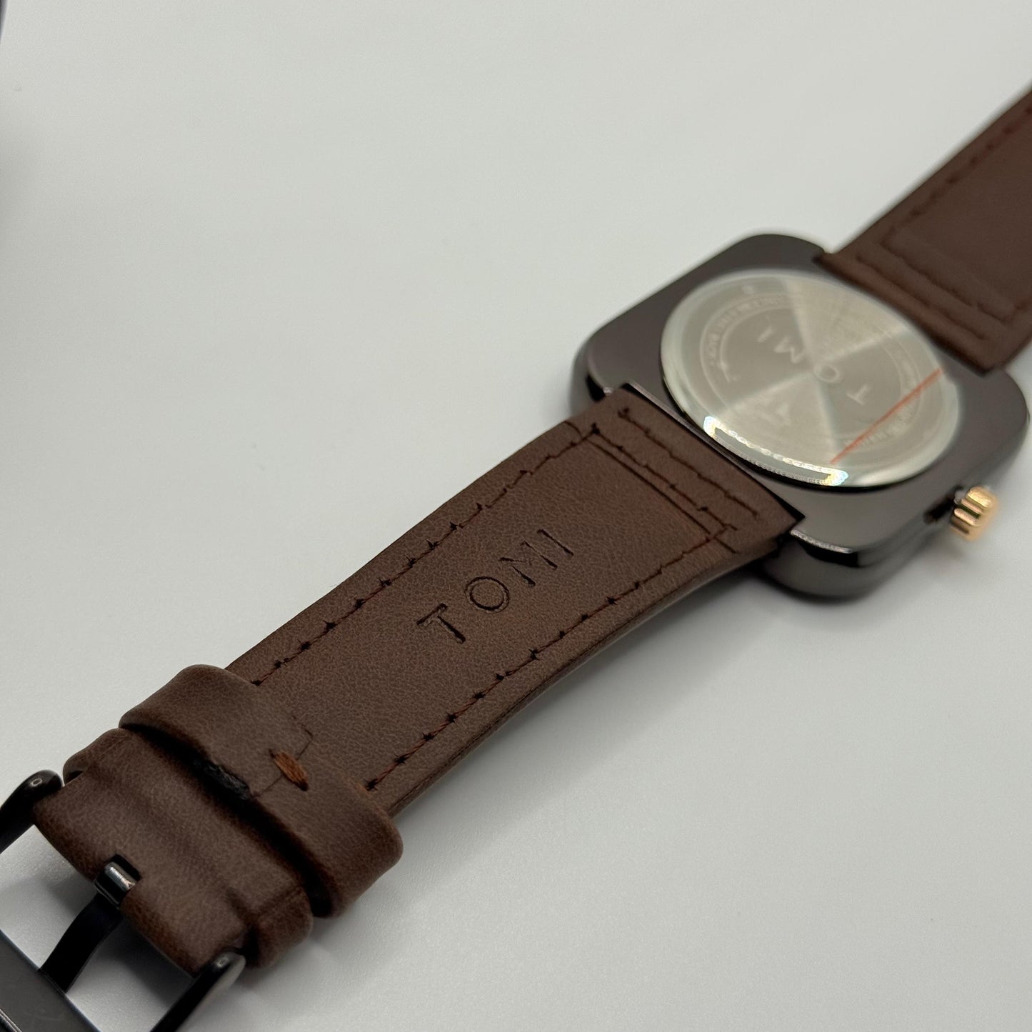 TOMI brown colour strap with square dial watch